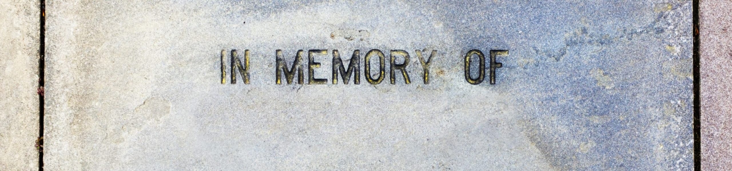 IN MEMORY OF plaque. Copy Space.